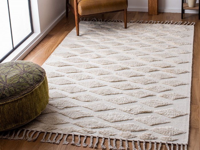 Create texture and contrast with an area rug